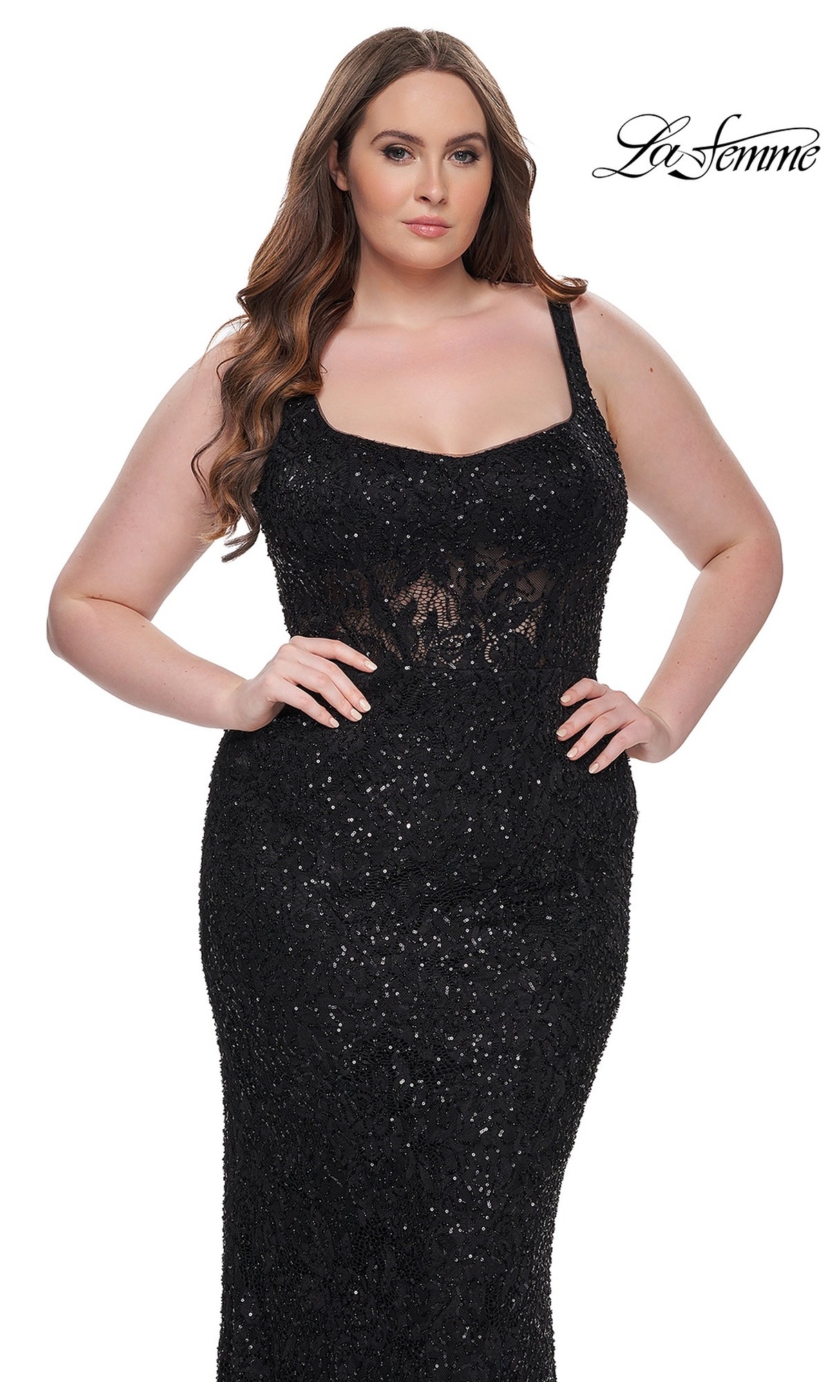 A woman models the Plus-Size Lace Prom Dress: La Femme 31535, a sleeveless fitted black gown with sequin and lace details, against a plain white background. The La Femme logo appears in the top right corner.